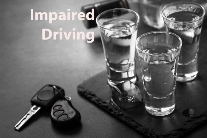 Impaired Driving keys and vodka shots